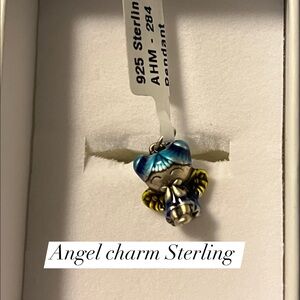 Sterling silver Angel Charm. The beauty is so adorable